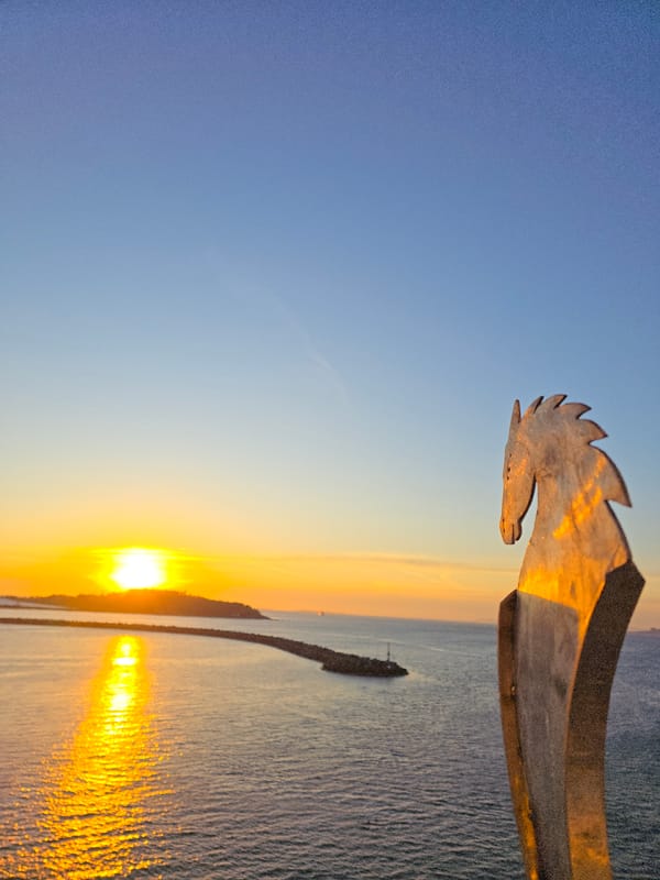 Sunset captured over Randaberg coast with horse sculpture visible