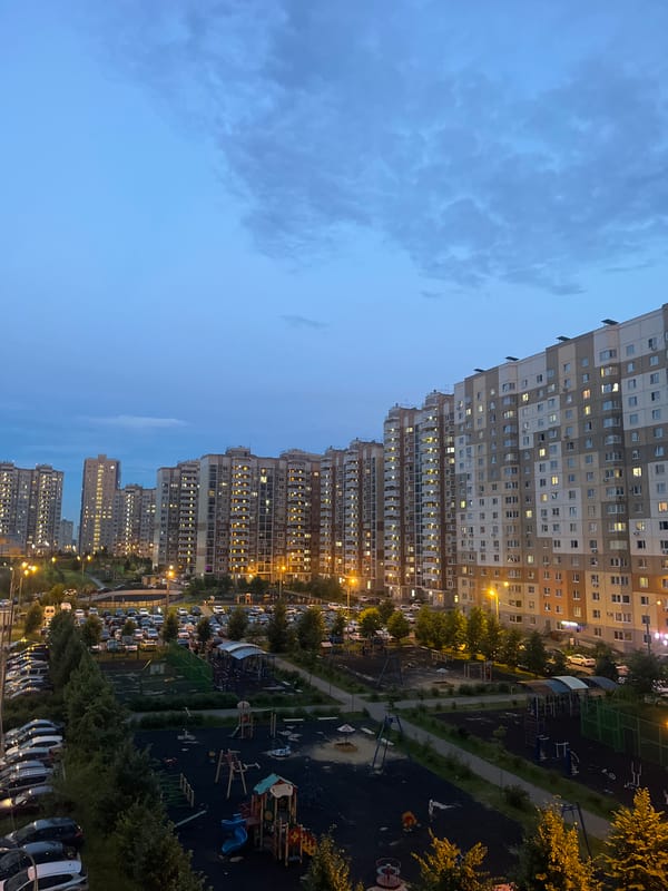 Domodedovo apartment district at dusk, indoors and out