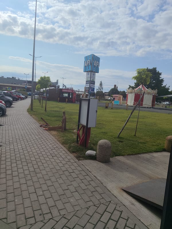 Morning scenes around a commercial strip in Arad, Romania