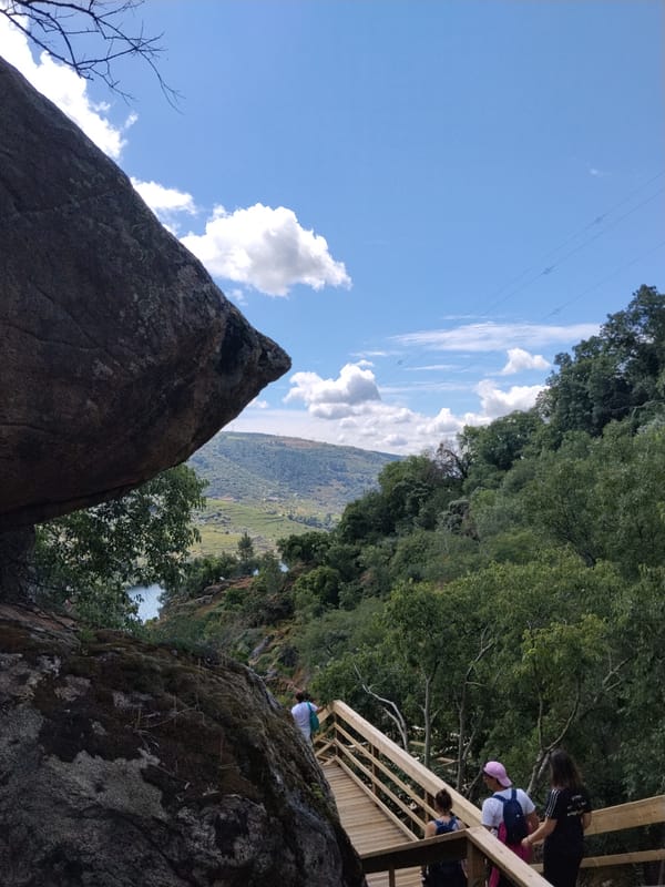 Tourist explores Douro River walkways and waterfalls in Alijó