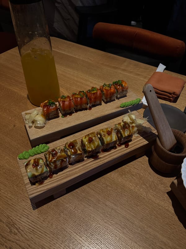 Diner documents extended restaurant meal with sushi, appetizers in Krasnoyarsk
