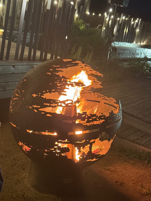 Fire pit and full moon at a quiet Belarusian lakeside