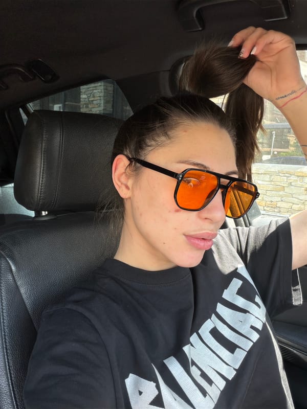 Woman spotted relaxing in car passenger seat in Bansko