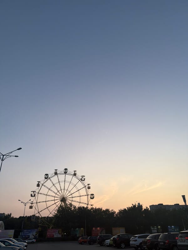 Evening out near a Ferris wheel in Tolyatti, Russia