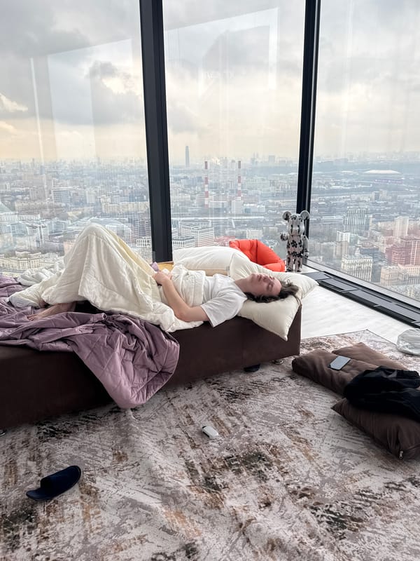 Young man rests on sofa in Khimki, Russia