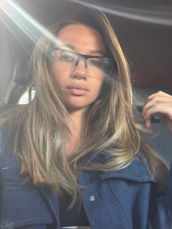 Woman in denim jacket observed inside vehicle Friday morning