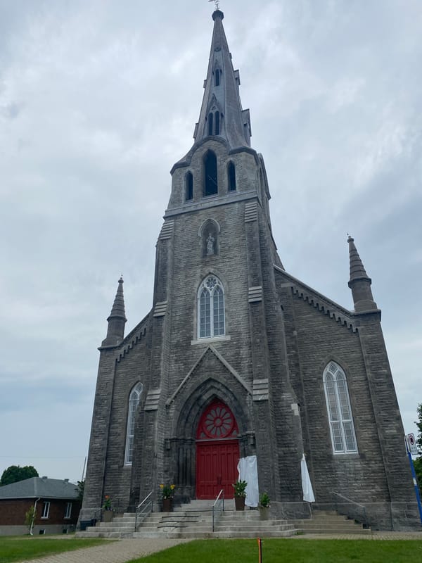 Pointe-Claire village: church, lakeside murals, and summer details
