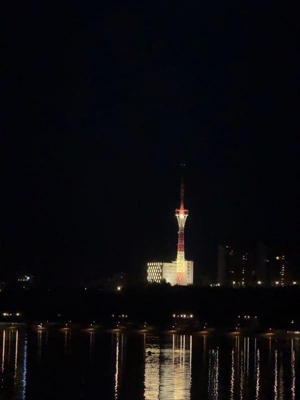 Nighttime cityscape reflections captured across Perm's Kama River