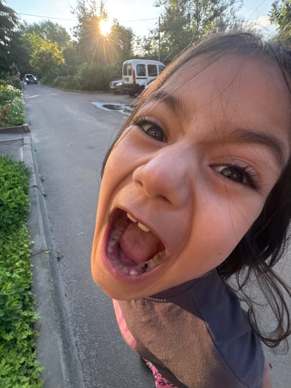 Girl in Stitch shirt plays on residential streets