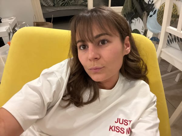 Woman takes multiple selfies during photo session in Cannes