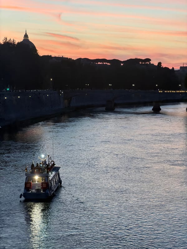 Twilight street performances draw crowds near Rome's Tiber River