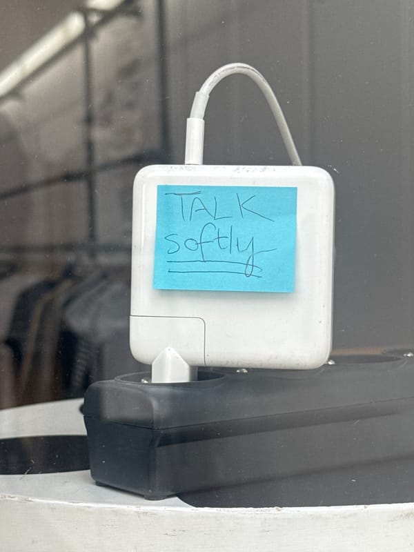 White power adapter observed charging in Paris electrical socket