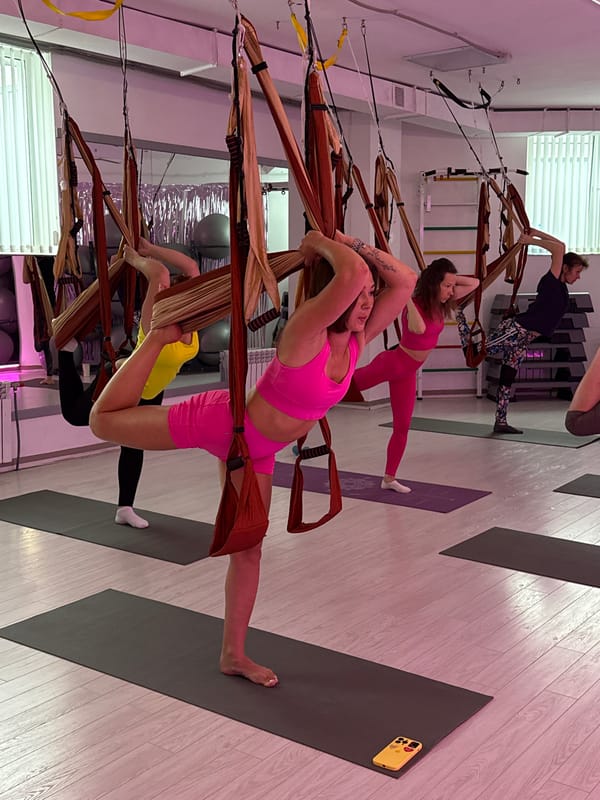 Aerial yoga class documented in Chaikovsky fitness studio