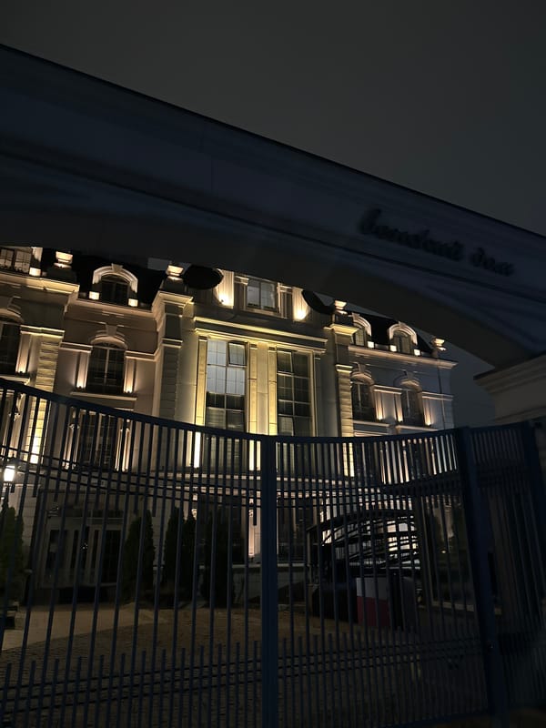 Night out near a lit classical building in Almaty