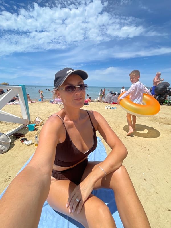 Relaxing on the beach in Anapa on a summer morning