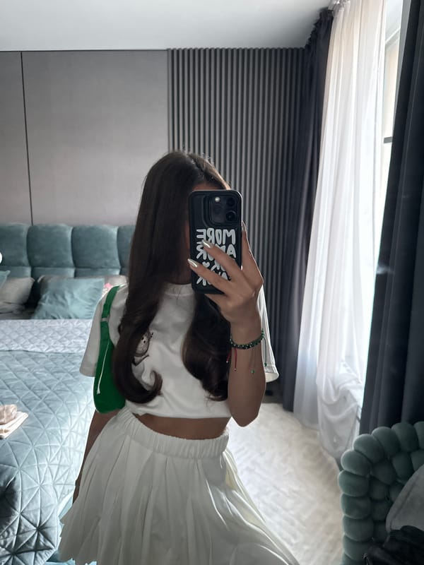 White outfit, green bag, mirror selfies in a Sofia bedroom