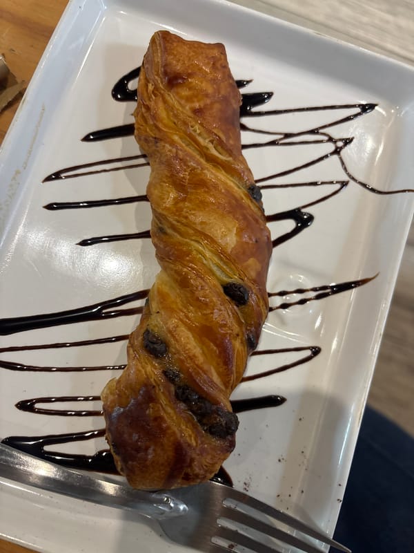 Flaky twisted pastry displayed on plate in Cuernavaca