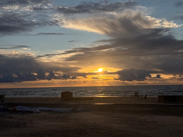 Golden sunset over a sandy Riga beach