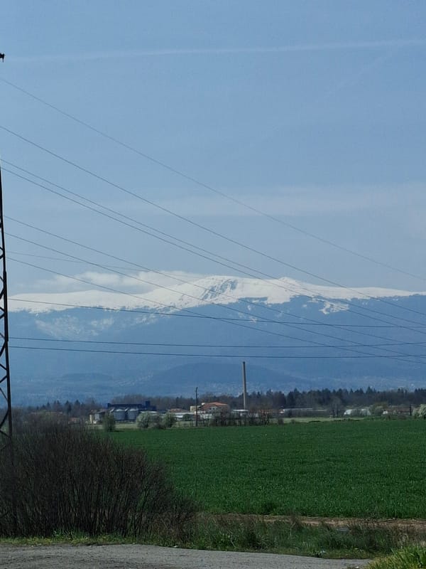 Spring mountain vista documented along roadside in Kazichene, Bulgaria