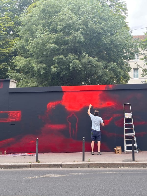 Street murals and sidewalk life in east Paris
