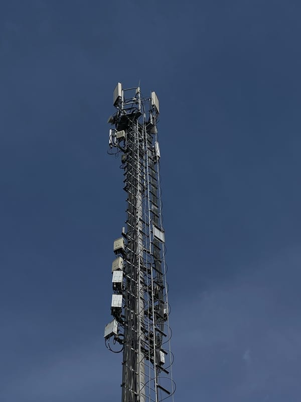Morning scenes captured in Krasnoyarsk: communication tower, vehicle servicing