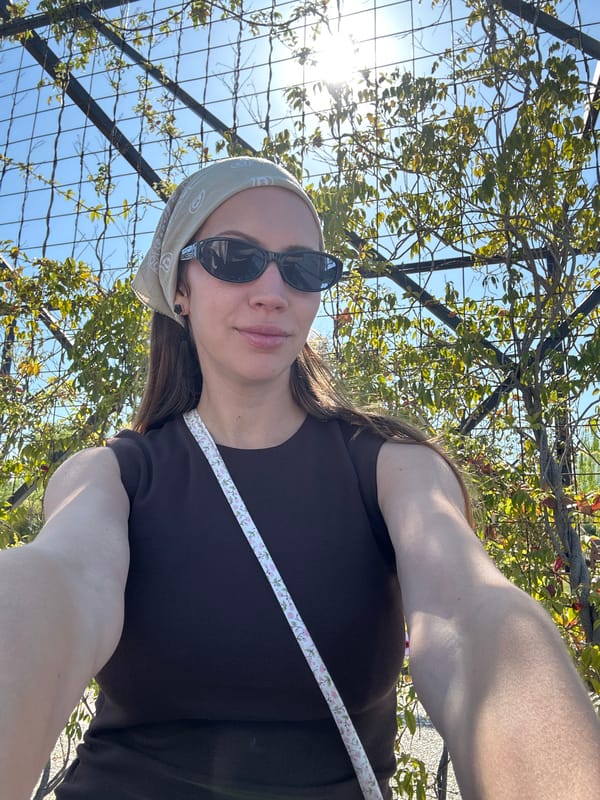 Woman takes morning selfies in sunny Fethiye, Turkey