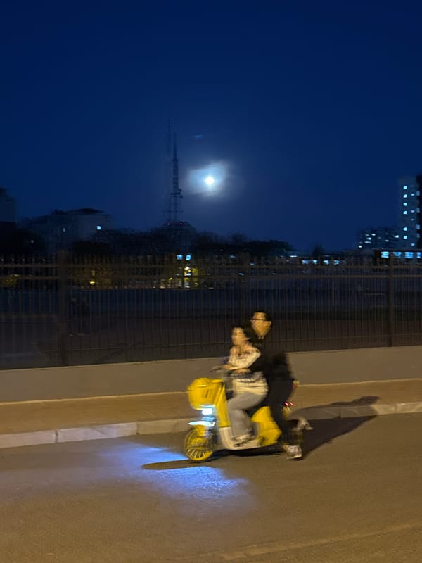 Full moon illuminates nighttime street scene in Zhongtun, China