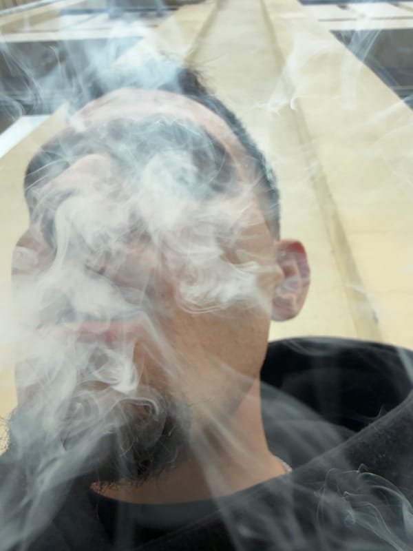 Man photographed with smoke, vehicle interior captured in Shumen