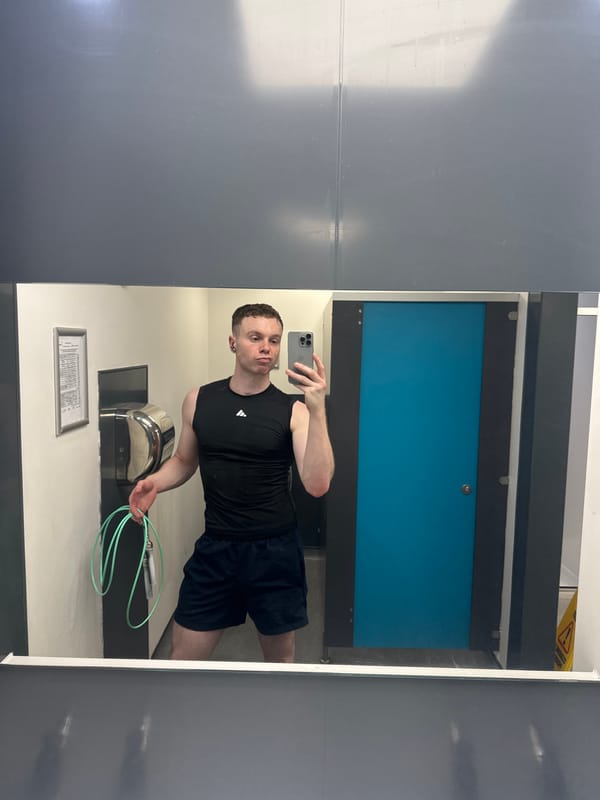 Man exercises with jump rope while using phone in London