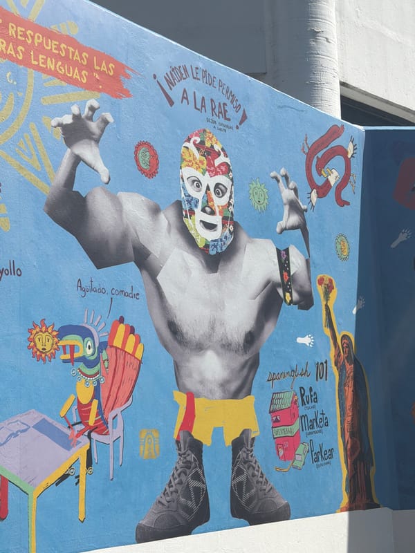 Public art installation with mural and informational signage documented