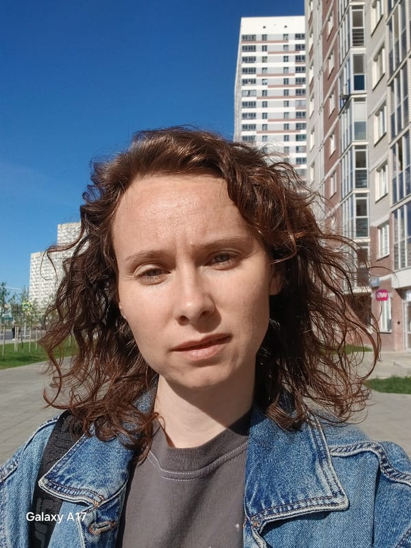 Person films selfie content in early morning Yekaterinburg