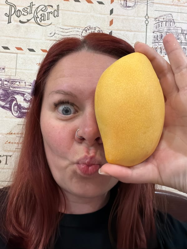 Woman prepares mango dessert in Chaikovsky, Russia