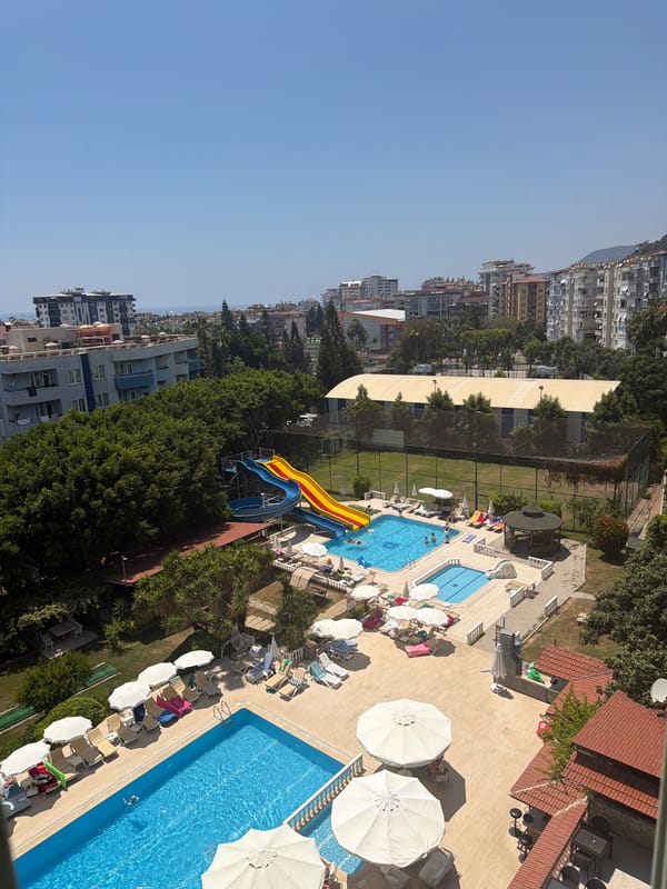 Resort pools and city streets on a sunny morning