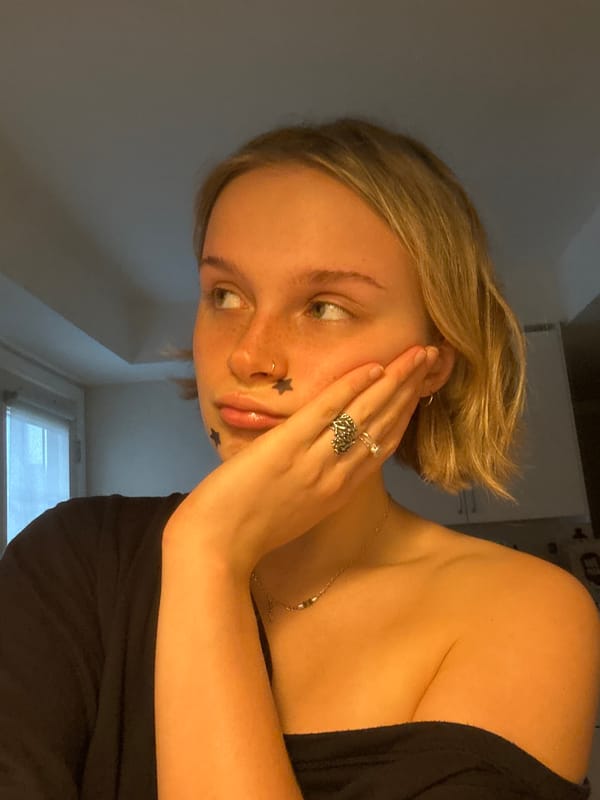 Woman photographed in multiple poses indoors in Vancouver