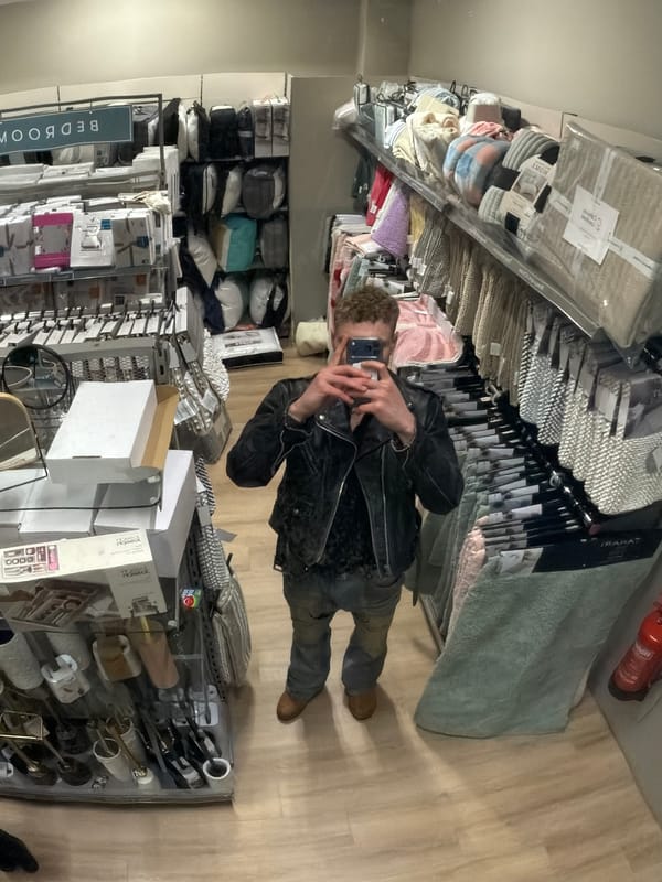 Person takes selfie in London retail store