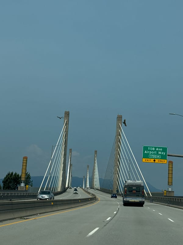 Aerial view of a busy Langley bridge under overcast skies