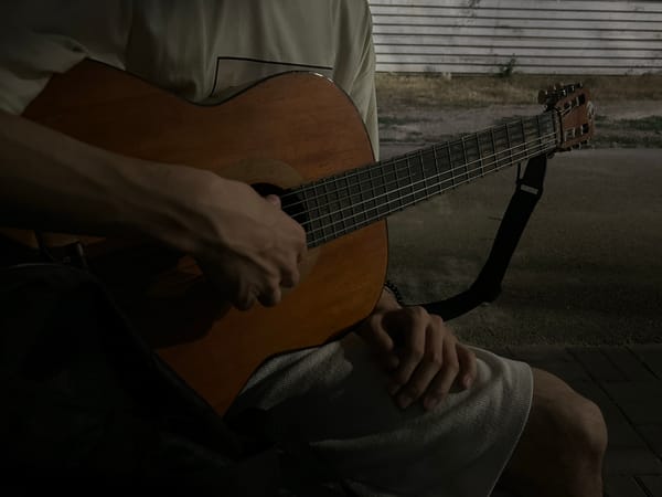 Guitar playing and evening strolls in a Taraz park