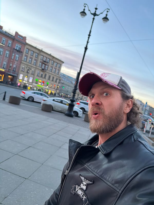 Man in skull-patched leather jacket photographed in Saint Petersburg