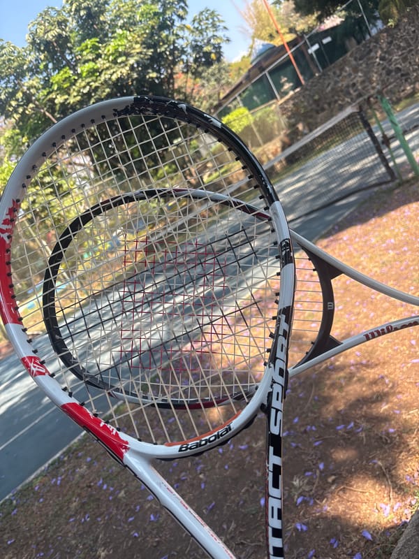 Tennis player enjoys snacks amid blooming Jacarandas in Cuernavaca