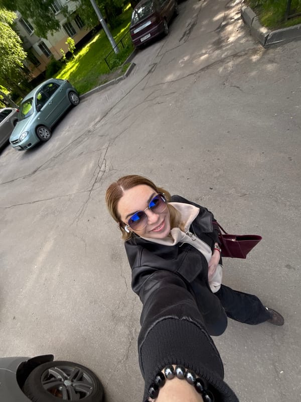 Woman photographs herself around Saint Petersburg parks and streets