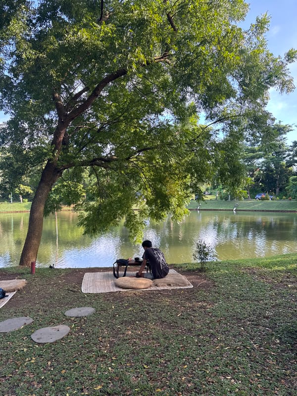 Morning coffee setup observed near tropical waterway in Pecatu