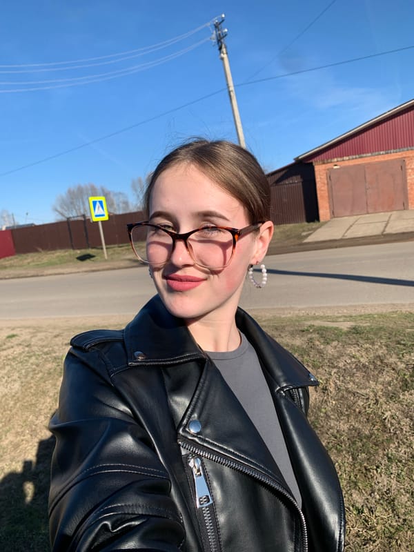 Young women take sunny outdoor selfies in Фоки, Russia