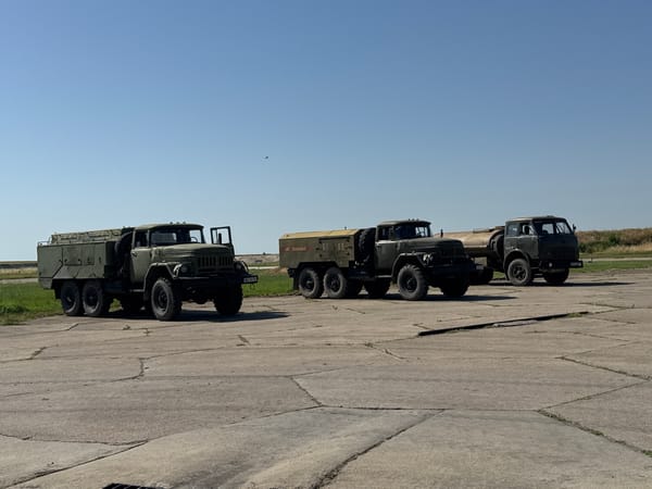 Military aircraft and vehicles at a Bulgarian airfield