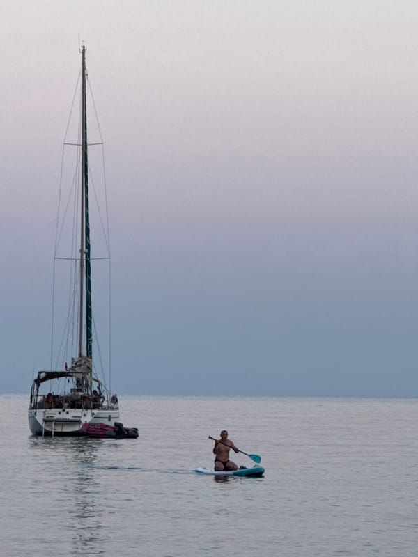 Paddleboarding on calm water off Partenit, Ukraine