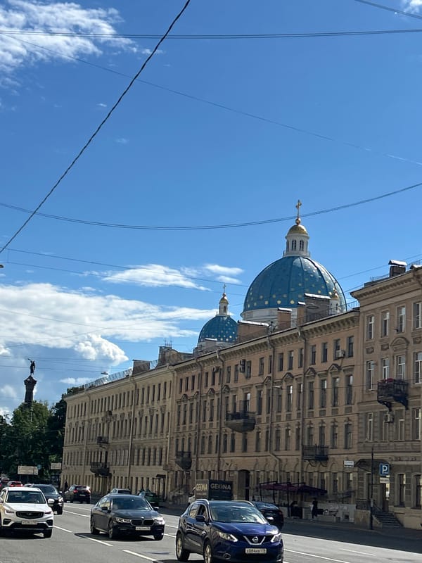 Canal streets, domed churches, and waterfront scenes in a European city