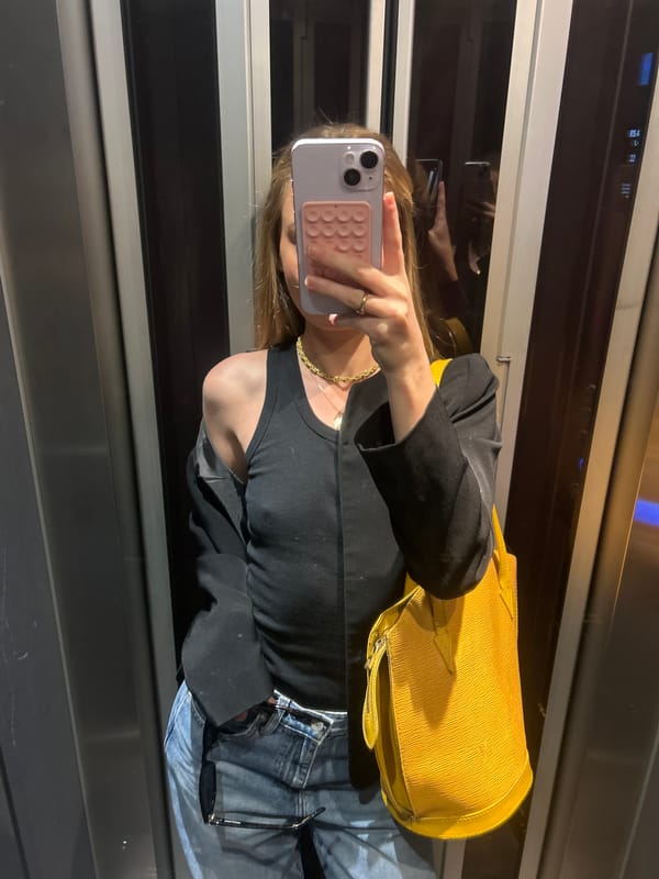 Urban scenes documented: elevator selfie, architecture, cityscape views