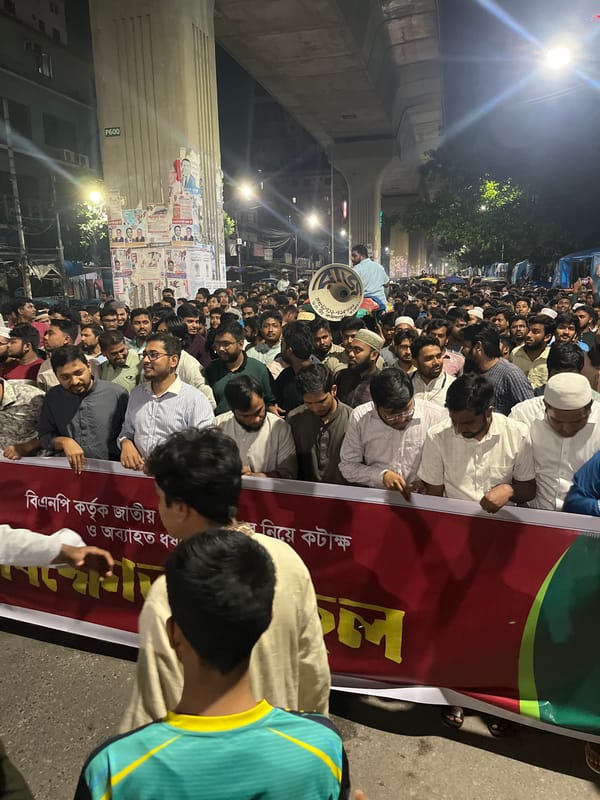 Political rally with revolution banners in Dhaka streets
