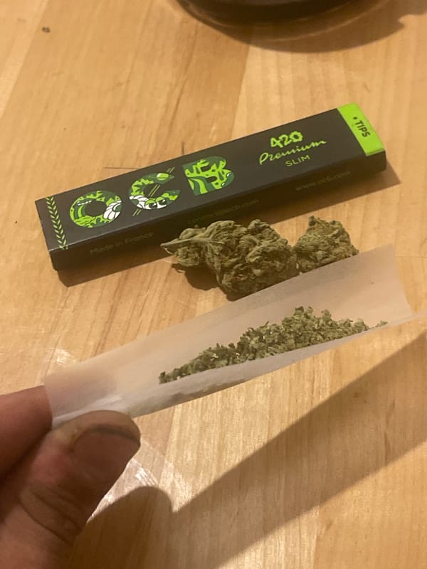 Cannabis roll-up session with a quick selfie thrown in