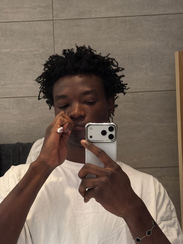 Young men capture casual selfies across London locations