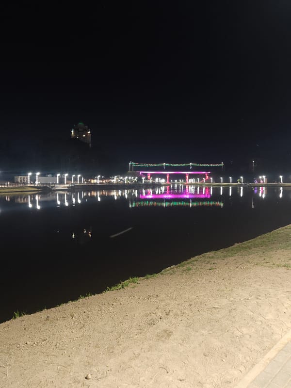Nighttime river reflections along the Mahilyow waterfront